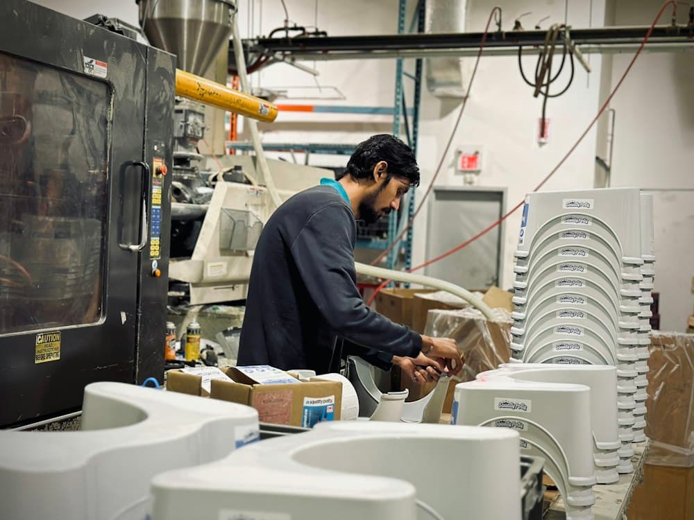 Injection moulding line in a manufacturing plant